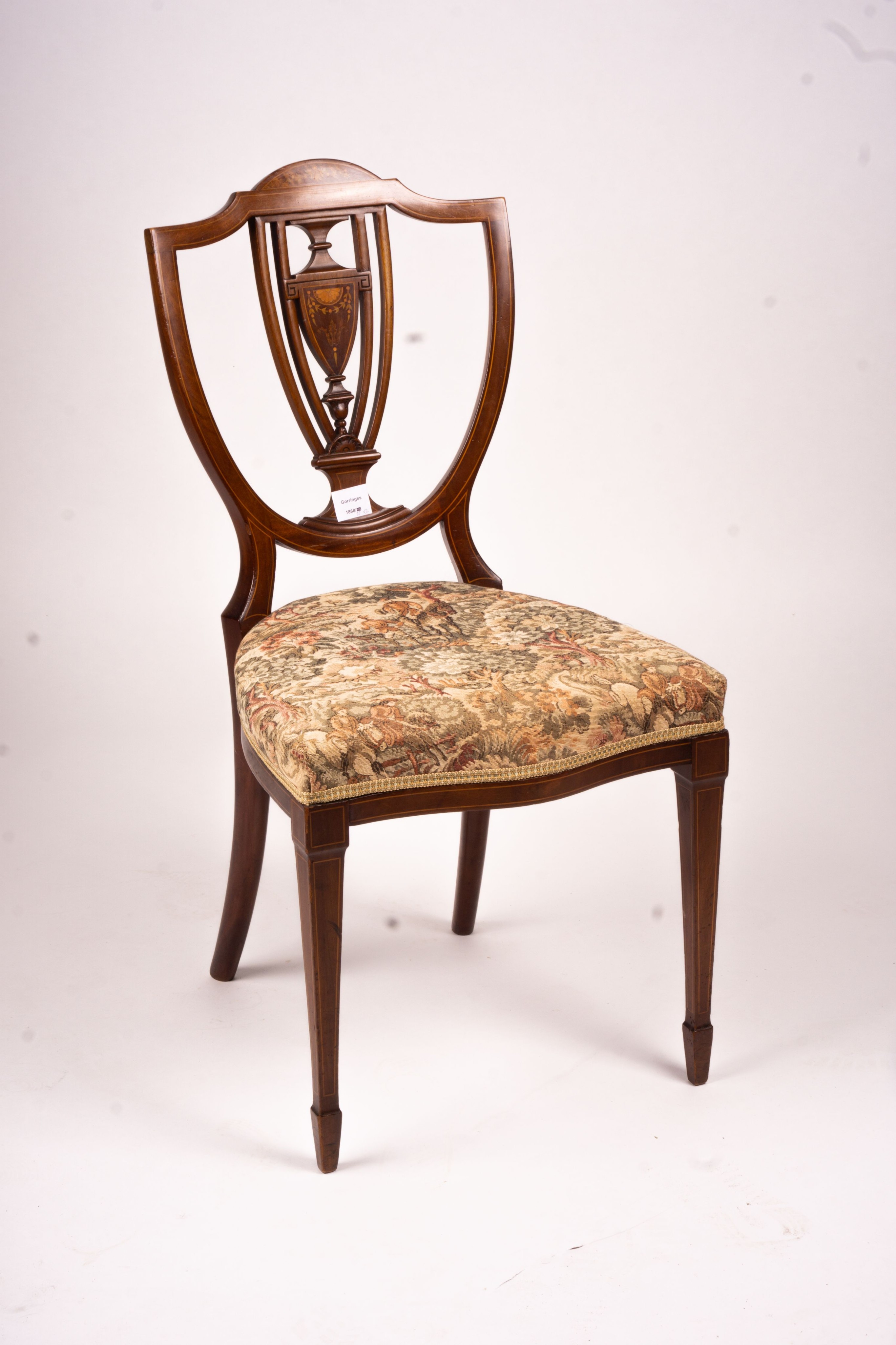 An Edwardian marquetry inlaid elbow chair (AF) and a side chair